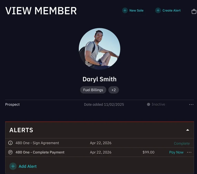 Member record with alerts for an unsigned agreement and a missed payment
