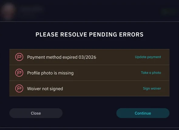 Kiosk asking the member to resolve an expired payment method, a missing photo, and an unsigned waiver